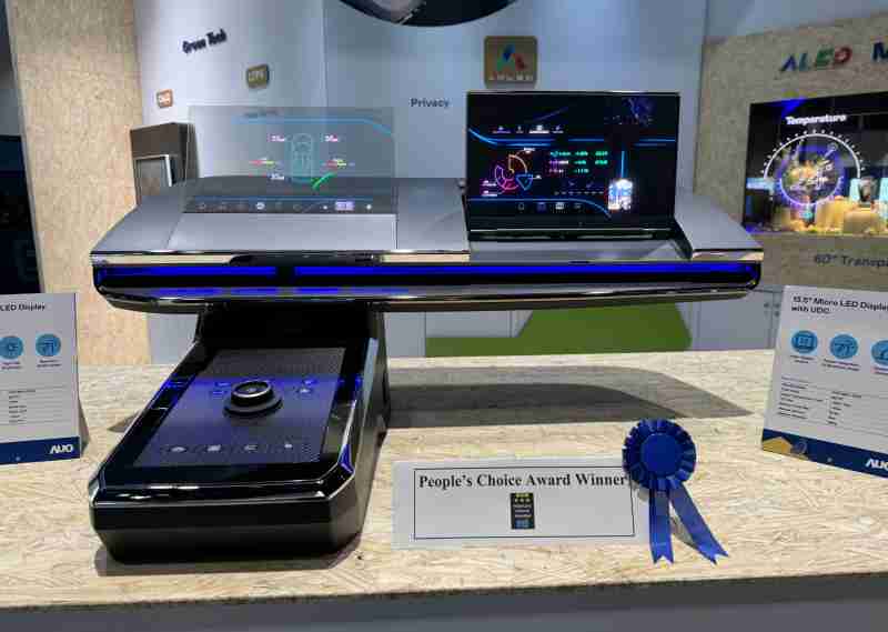 万利车用Micro LED Display HMI解决方案获”最佳车用显示奖”，，，以用户为中心开发，，针对前座驾驶与乘客设计兼具娱乐与安全的高画质屏幕，，，，包含车舱前座的Micro LED透明屏幕及全球首款内建镜头的智慧Micro LED显示器